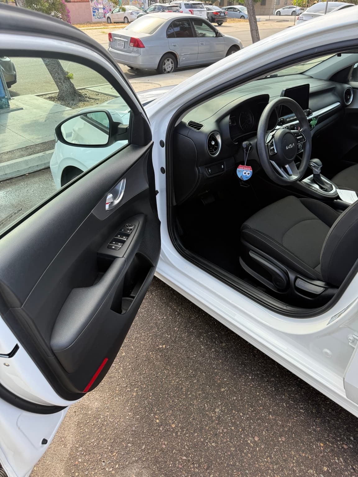Clean driver area in the white Kia after an Express Detail